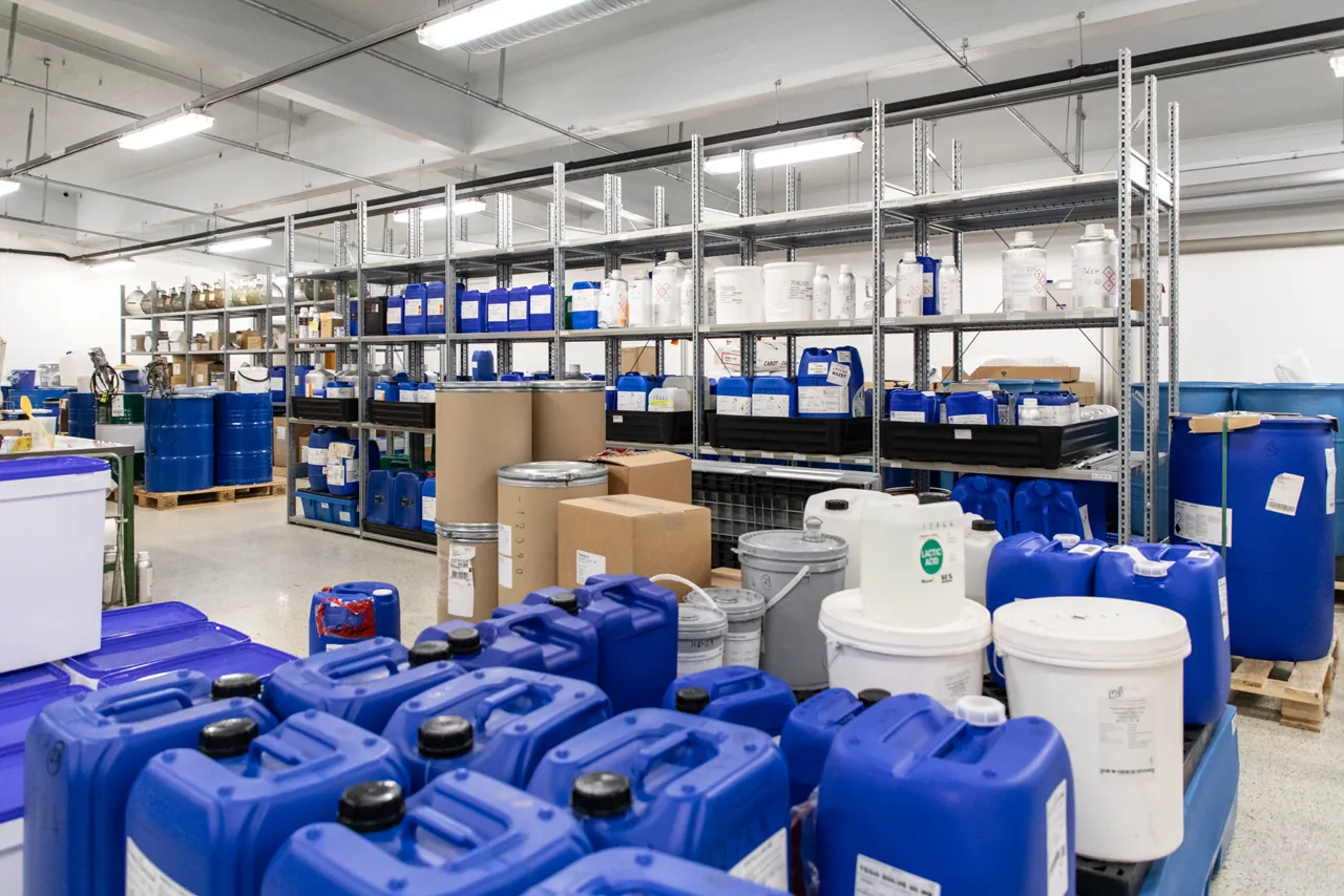 Raw material shelves in the Nordic BioCosmetic store at the Tuusula factory